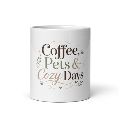 White glossy mug with Coffee, Pets & Cozy Days pet parent design.