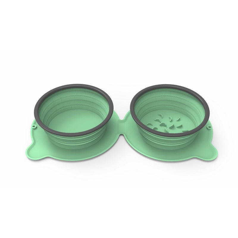 Green foldable double pet bowl with two collapsible silicone bowls and attached base