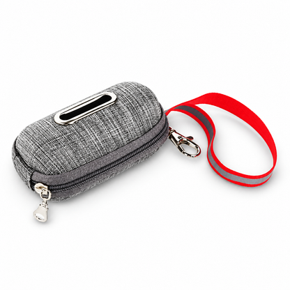 Dark Grey portable dog poop bag dispenser pouch with red carrying loop, zipper and dispensing opening