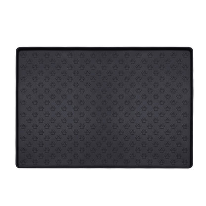 Black paw texture pet feeding mat with raised edge on a white background