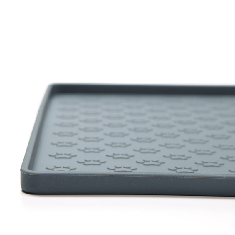 Gray pet feeding mat side profile showing the raised edge design