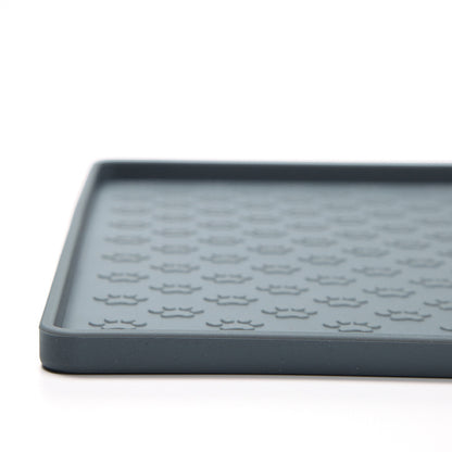 Gray pet feeding mat side profile showing the raised edge design