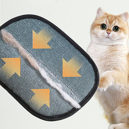 Pet grooming mitt showing the hair collection side with a cat beside it.