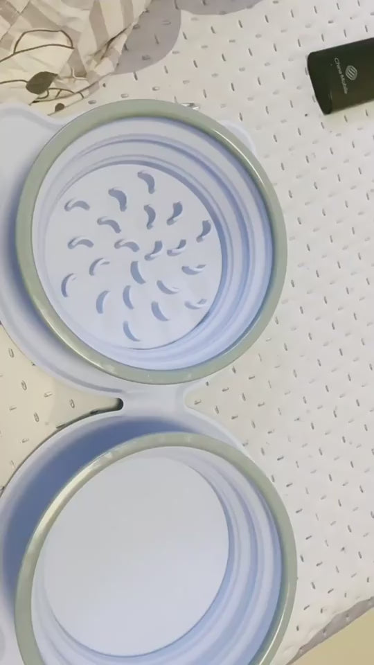 Video showing foldable double pet bowl design and collapsible bowl detail