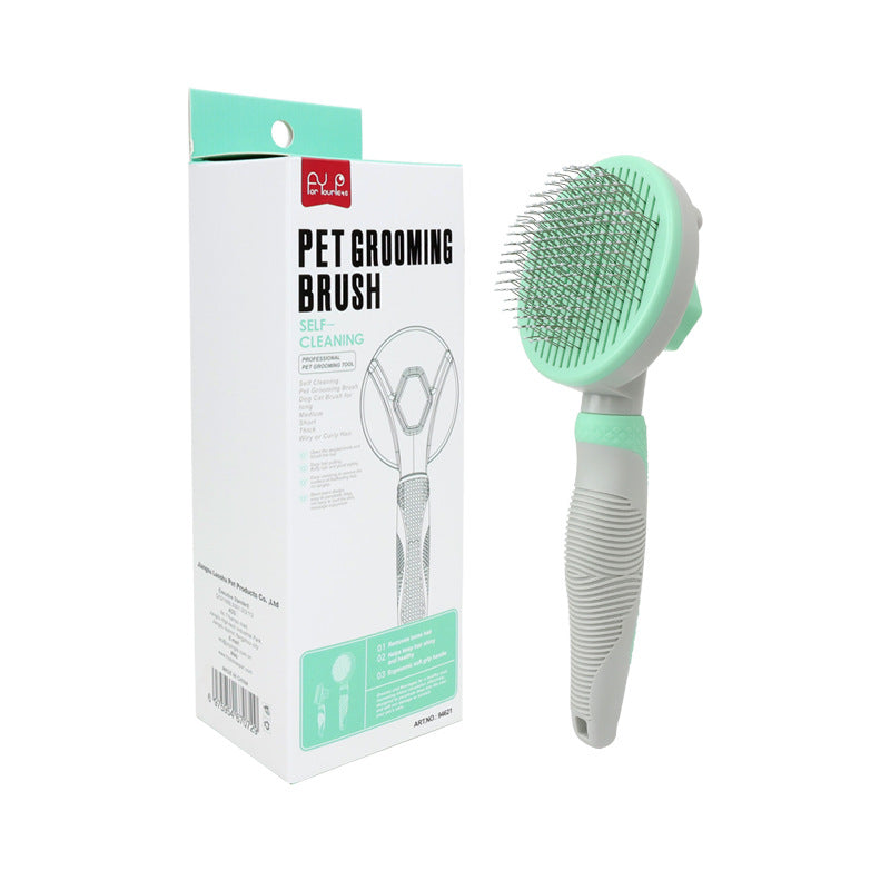 Green self-cleaning pet slicker brush shown beside its product packaging